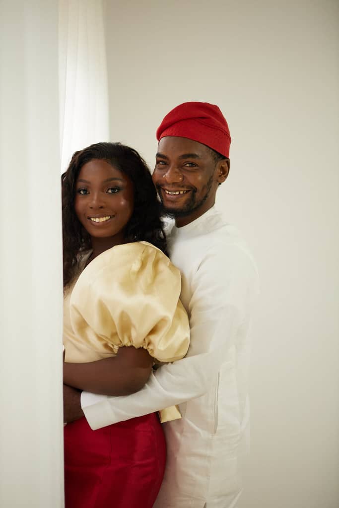 Opeyimika and Chima embracing and smiling