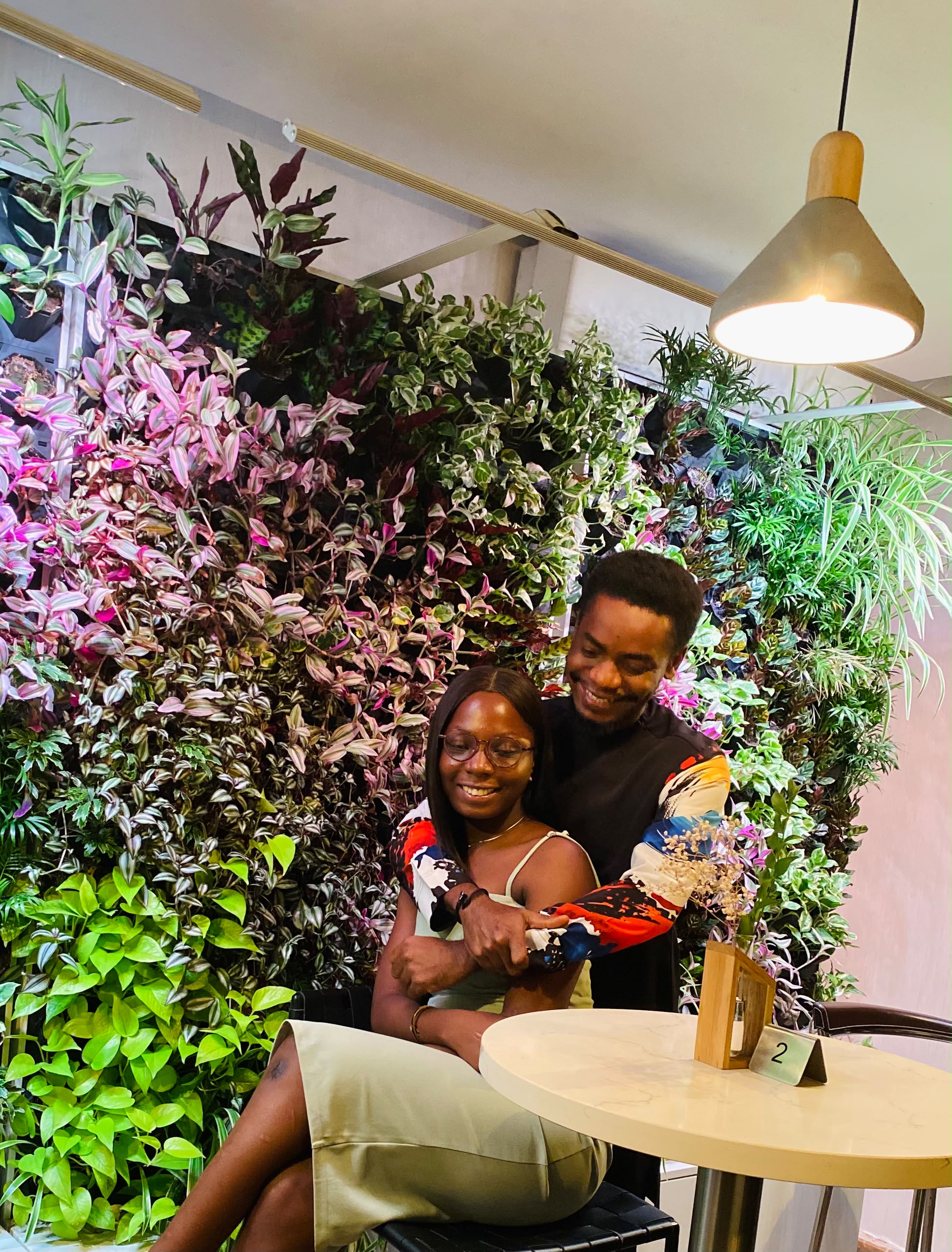 A joyful photo of Opeyimika and Chima laughing together